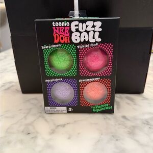 Teenie Nee Doh Fuzz Ball 4-Pack - Green, Pink, Purple, Orange